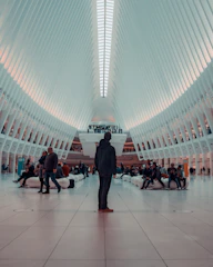 A peaceful community gathering in a sunlit, minimalist space fostering connection.