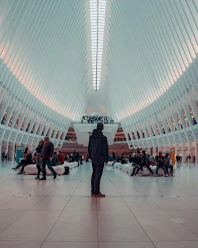 A peaceful community gathering in a sunlit, minimalist space fostering connection.