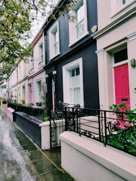 black and white houses near trees