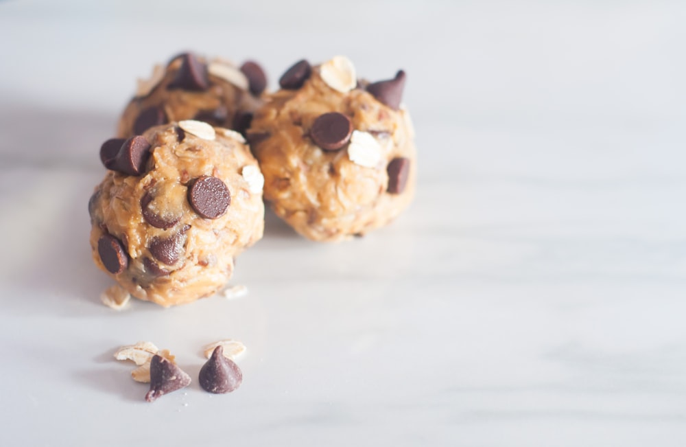 three round cookies with chocolate