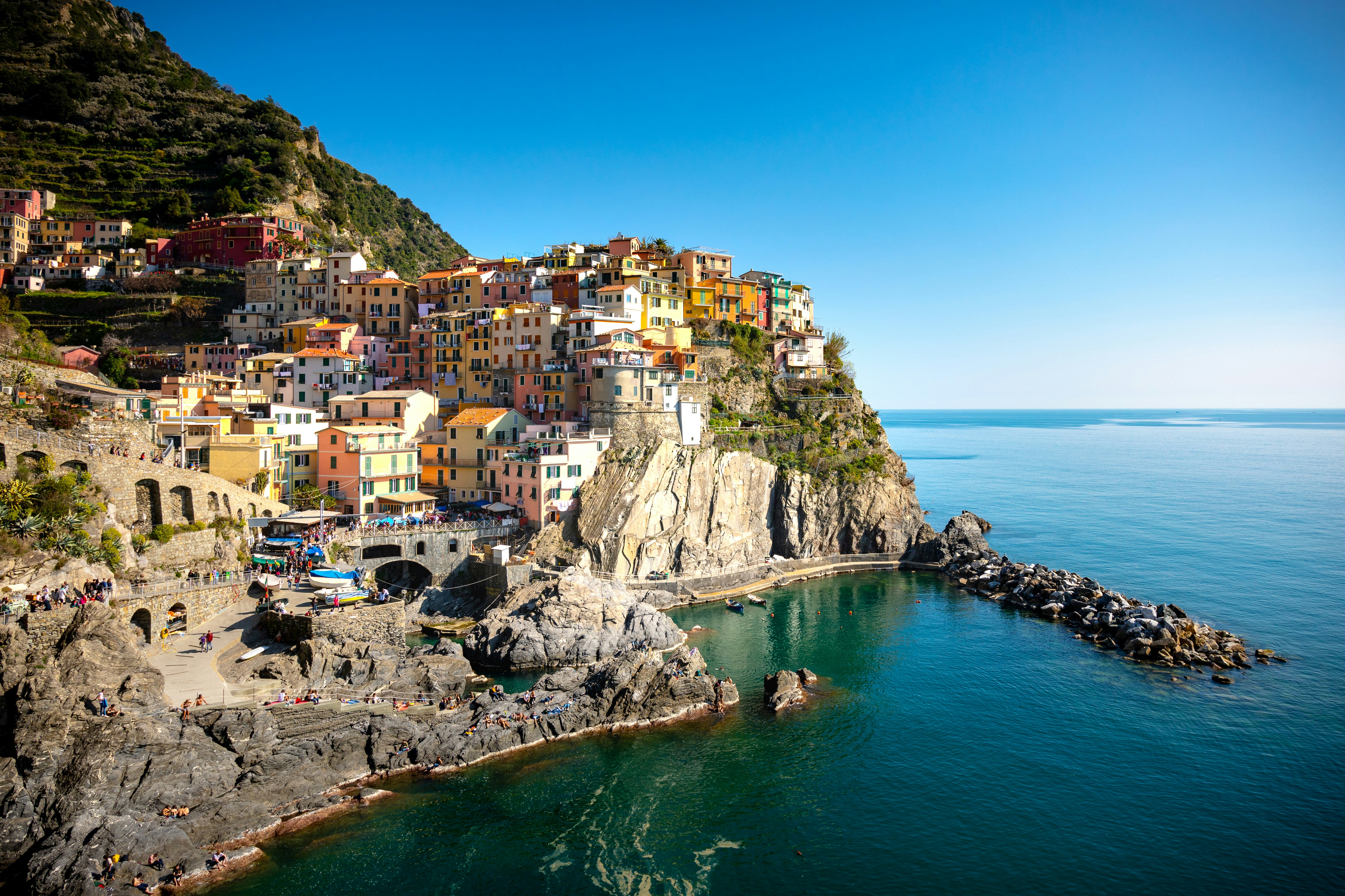 panoramic photography of city near cliff, Manarola, Cinque Terra Harbour