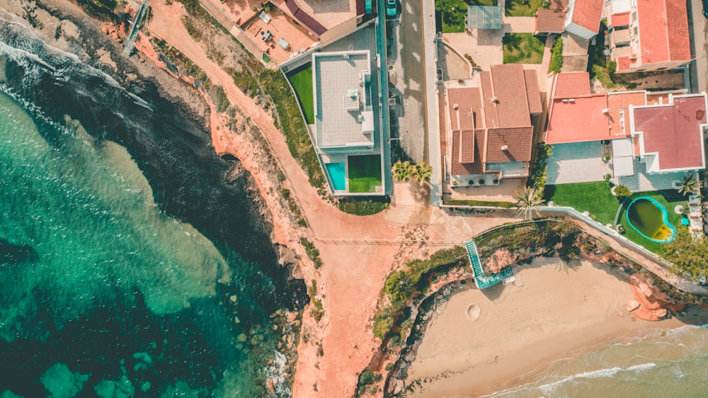 aerial view photography of city beside body of water