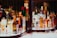 A cozy home bar setup with various bottles of spirits and glasses.