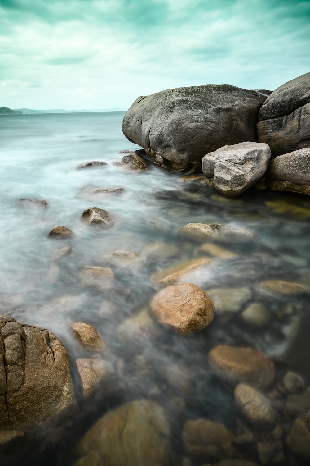 rocks on body of water