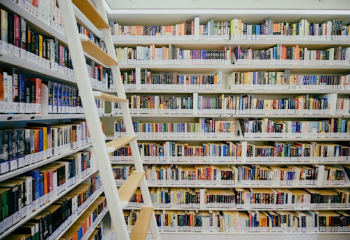 white wooden bookshelf