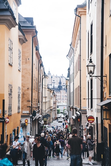 A charming pedestrian street lined with historic buildings.