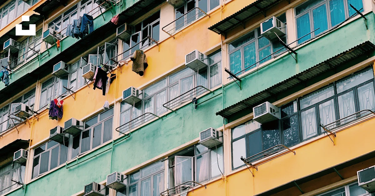 Green and yellow painted building photo – Free Building Image on Unsplash