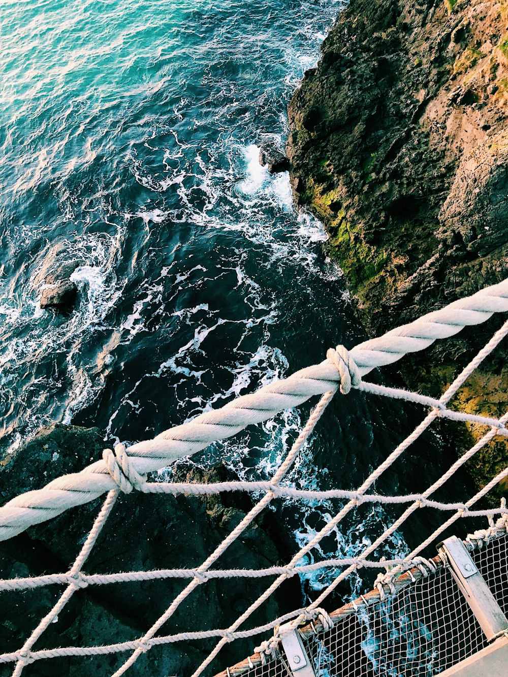 white bridge over body of water