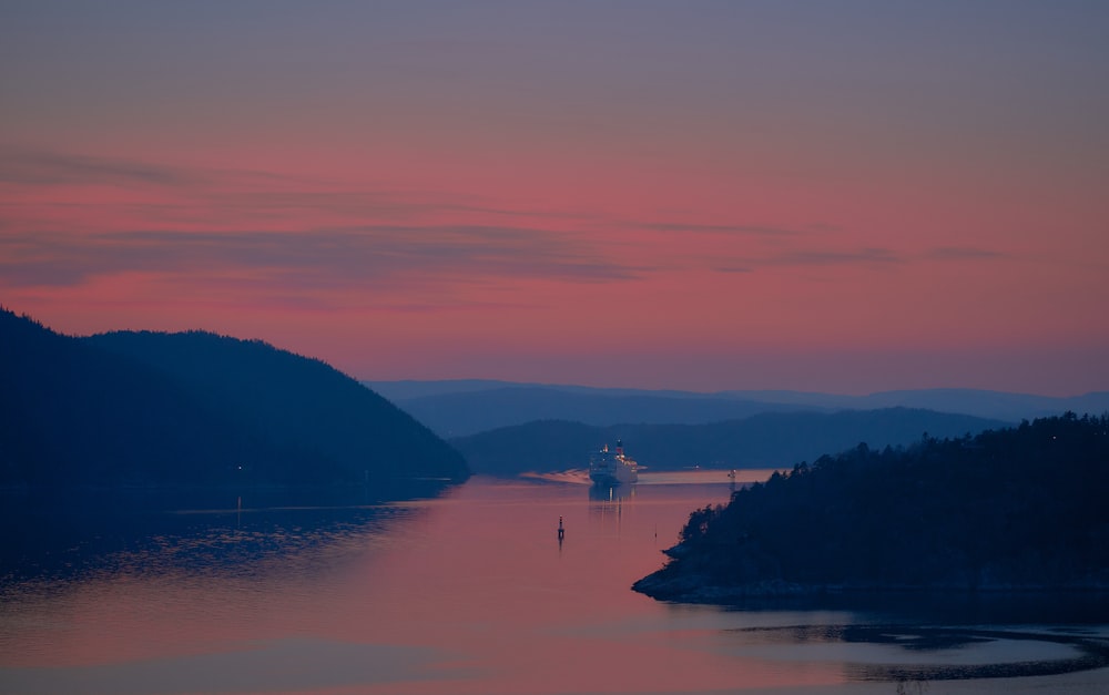 body of water under golden hour