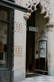 brown trolley under Hotel sign