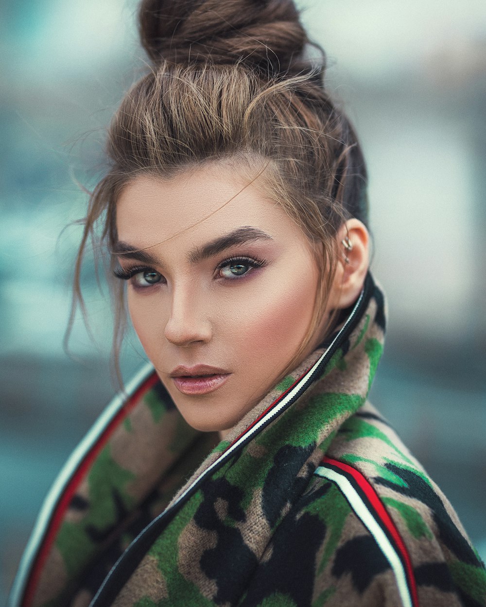 woman in camouflage jacket