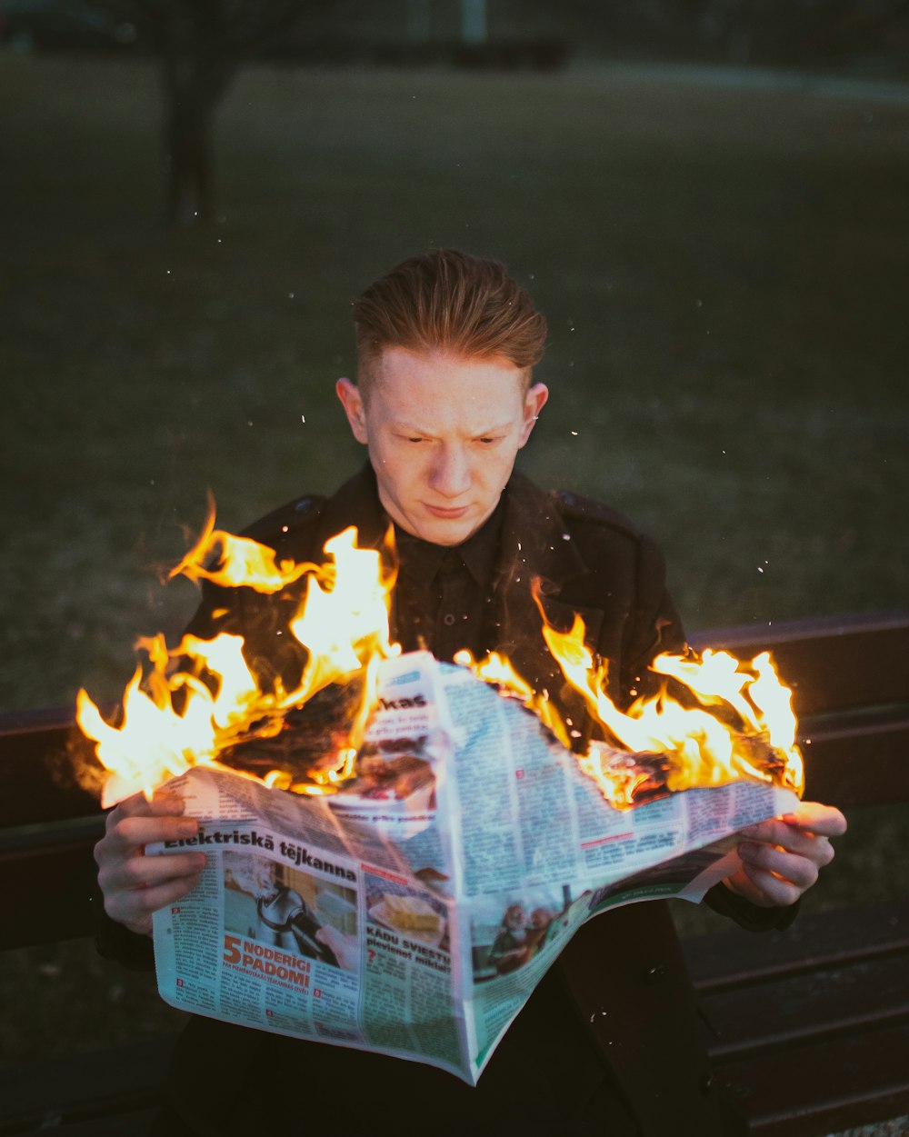 man holding newspaper