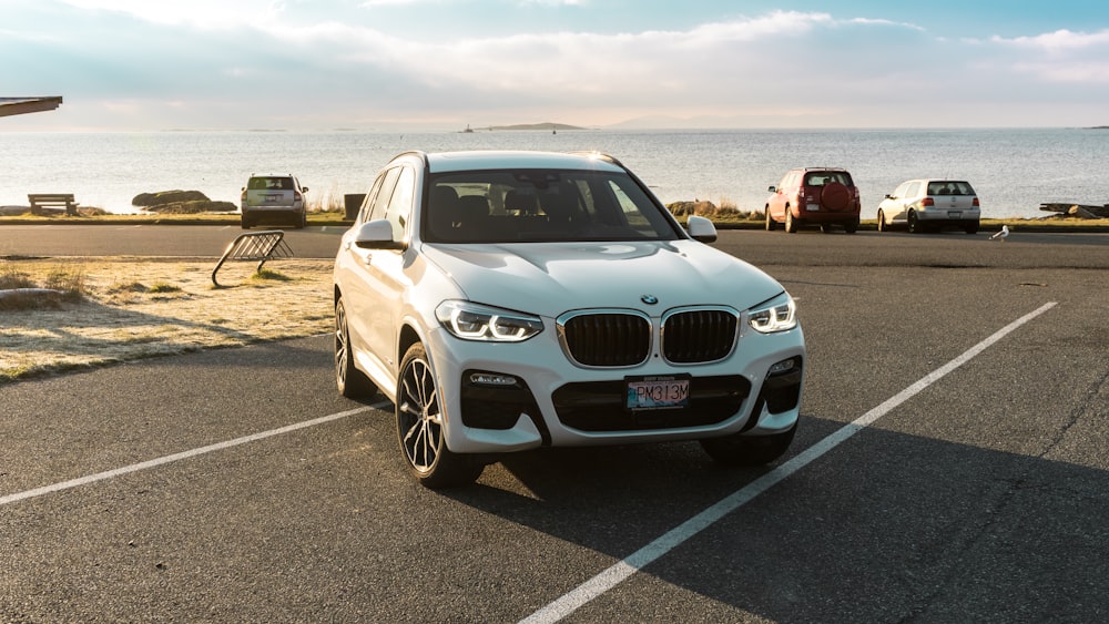 white BMW car parked on