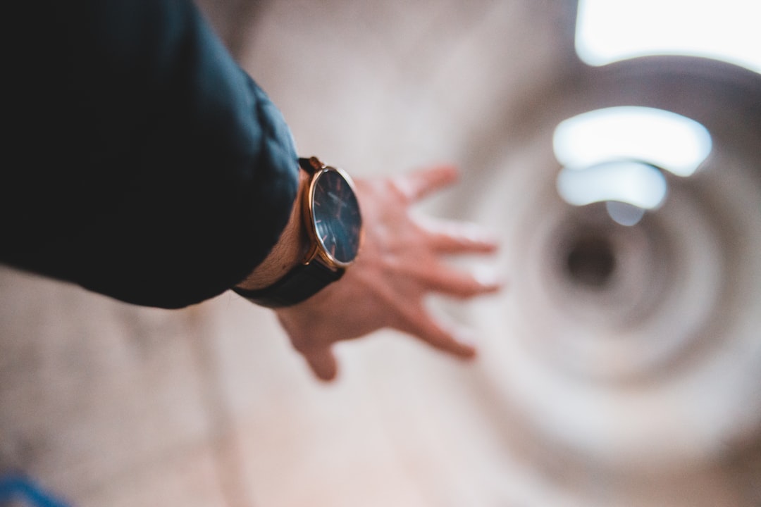 man wearing black watch