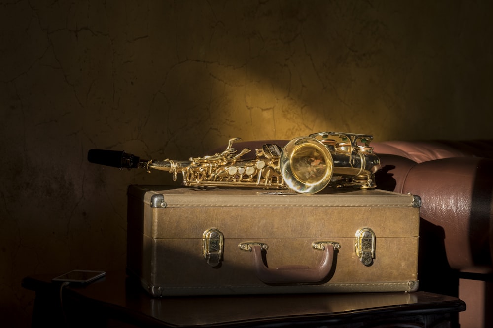 gold and black trumpet with box