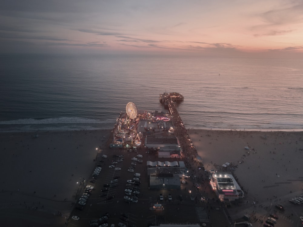 aerial view of buildings and vehicle park at the beach