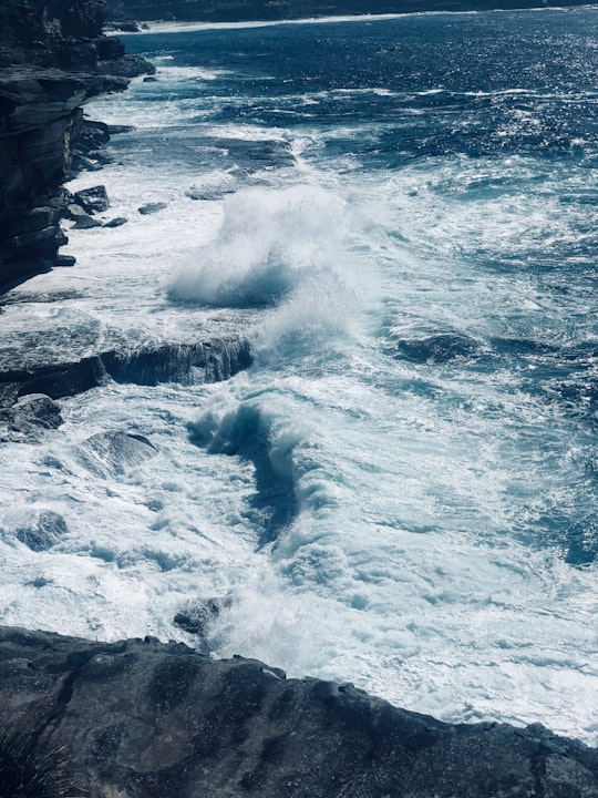 landscape photography of sea waves crashing on rocks in 145 Boundary St Australia