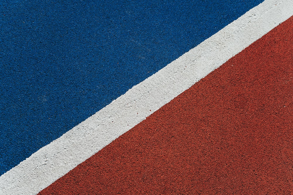 a close up of a tennis racket on a tennis court