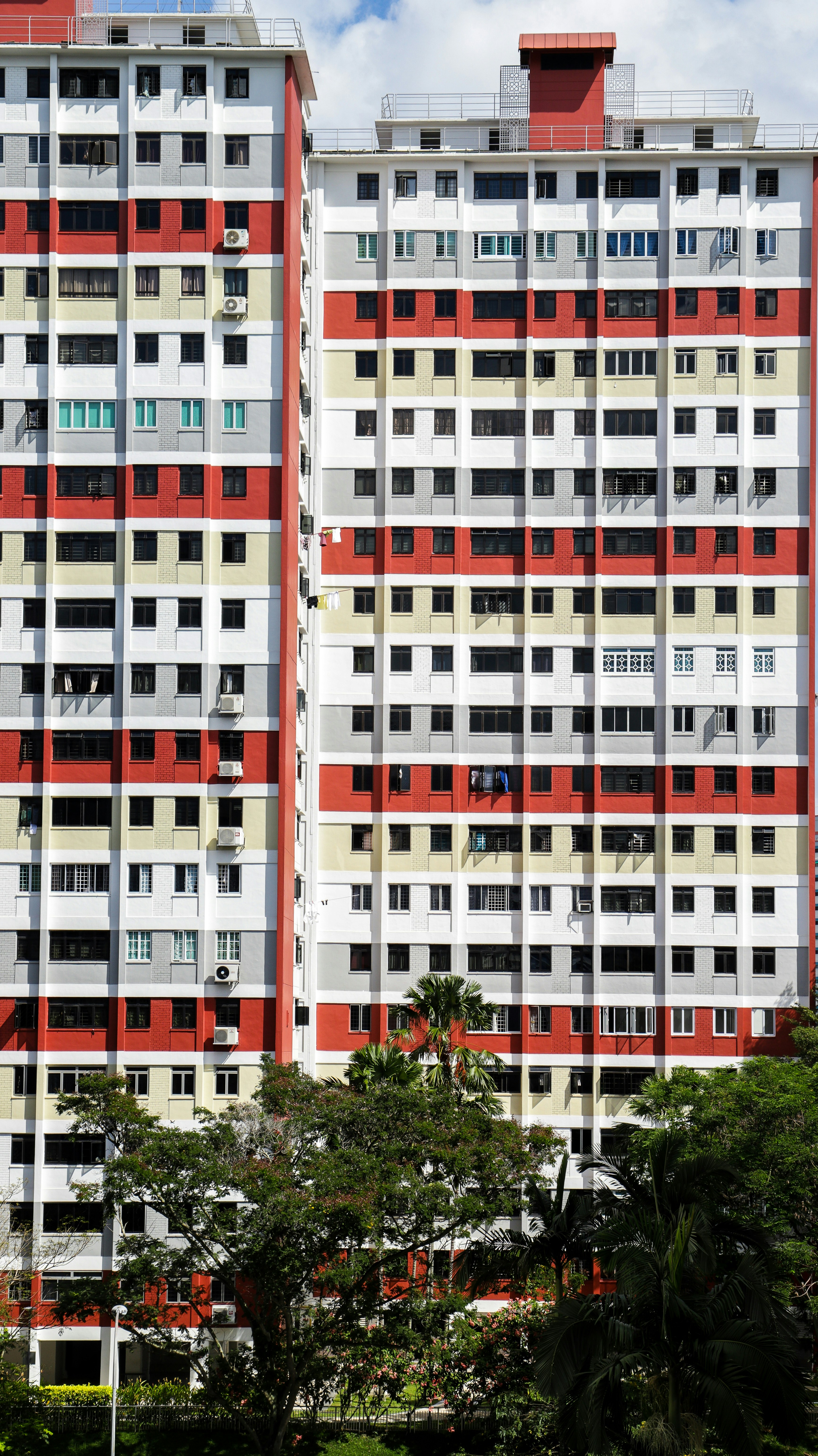 white and red concrete building during daytime