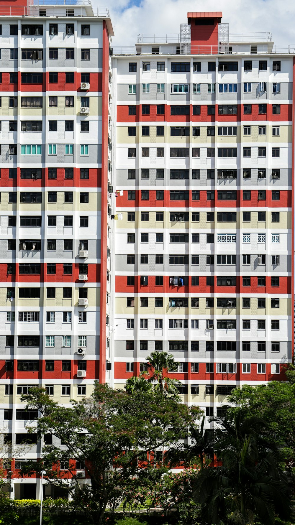 white and red concrete building during daytime