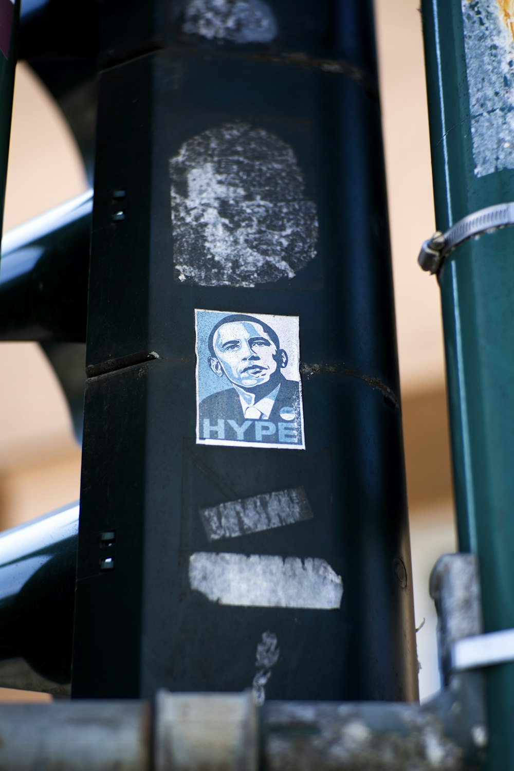 a picture of a man on a sticker on a traffic light