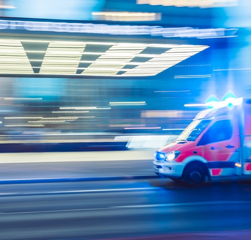 red vehicle in timelapse photography