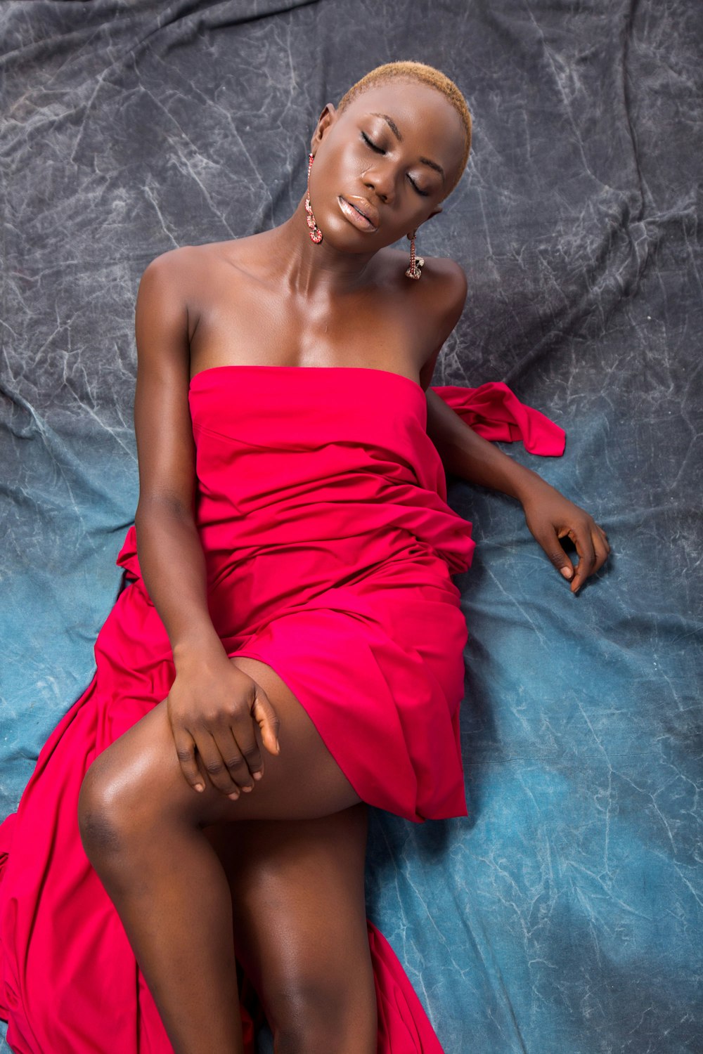 woman in red tube dress