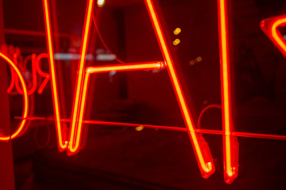 orange neon signage