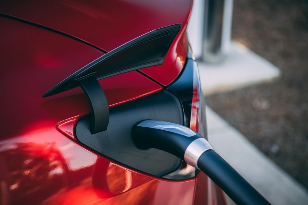 close-up photography of red car