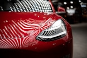 close-up photography of red car