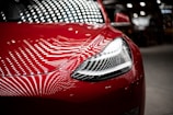 close-up photography of red car