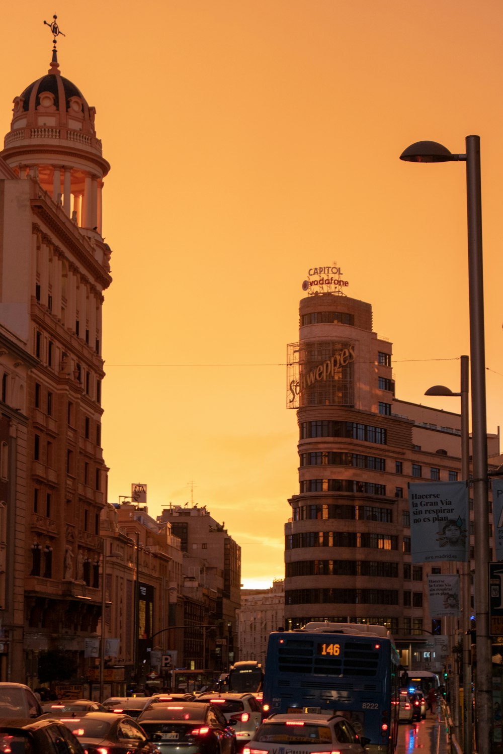 vehicles on street near buildings