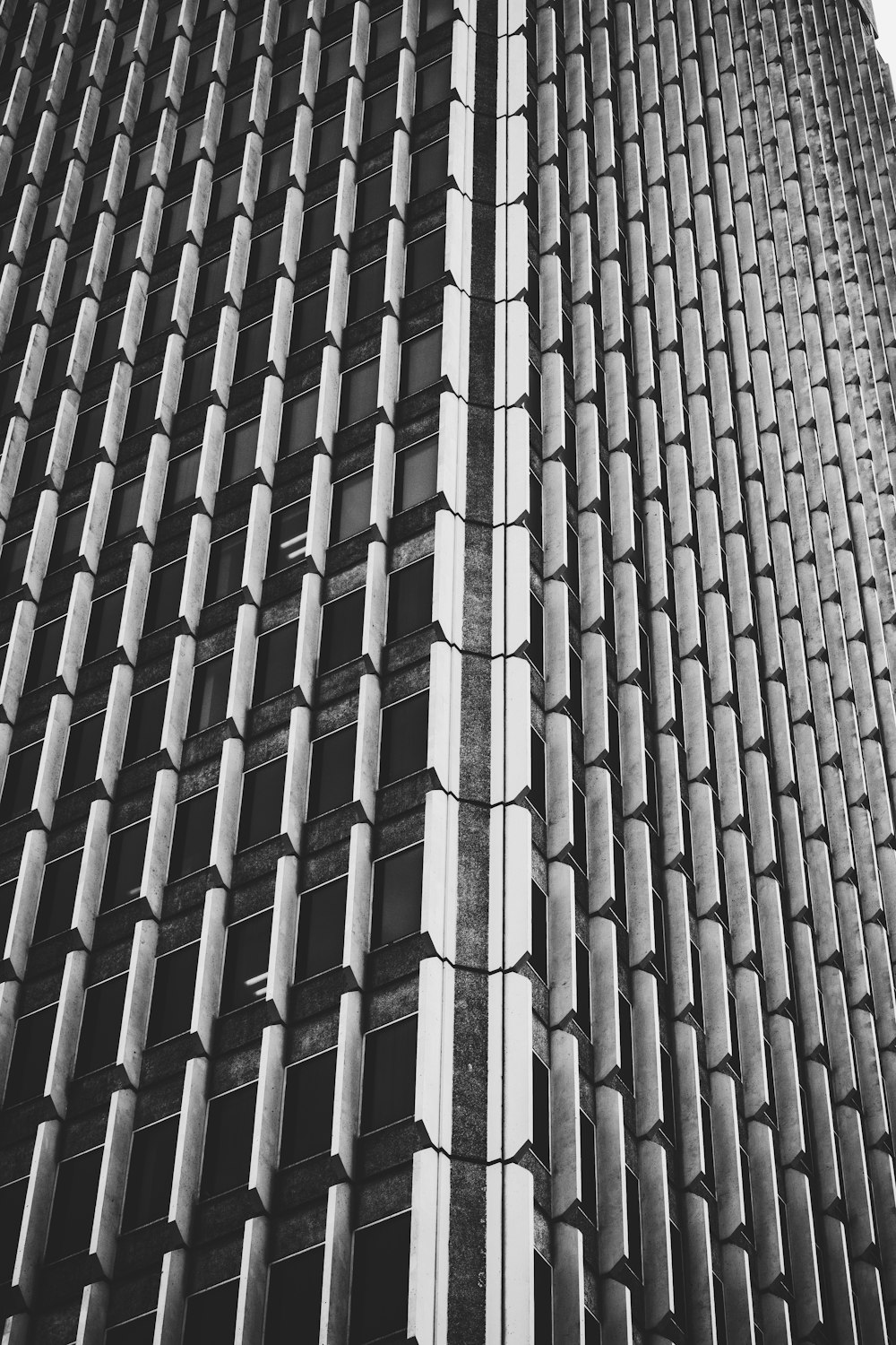 black concrete building in closeup photo