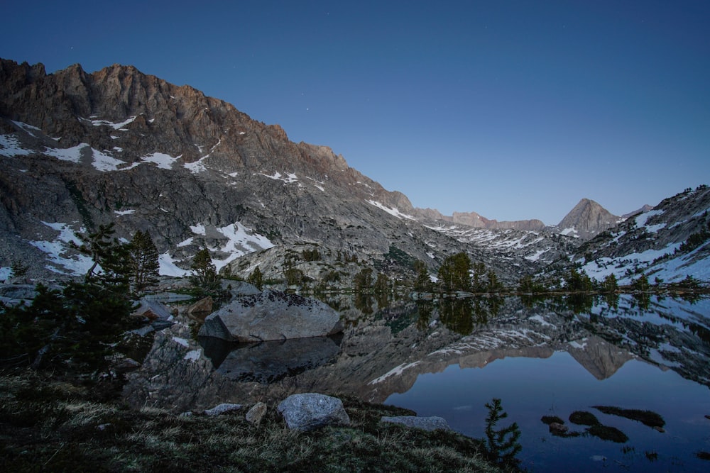 reflection of mountains on water