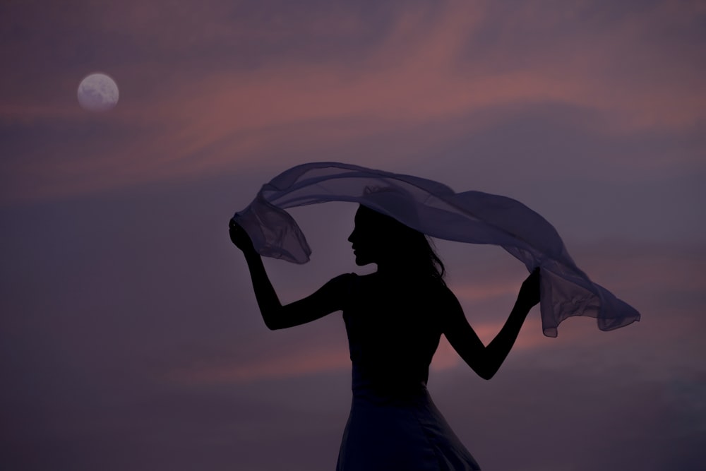 woman holding scarf