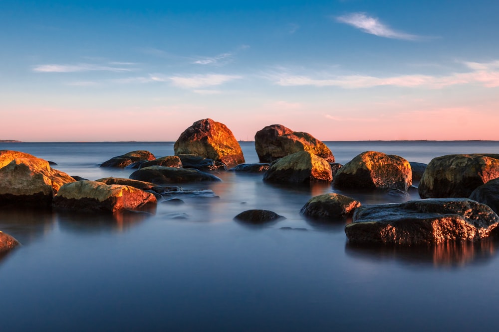 rocks on body of water