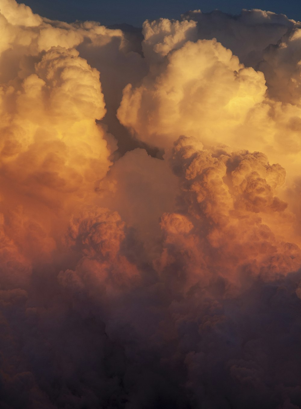 thick cloud formation during golden hour