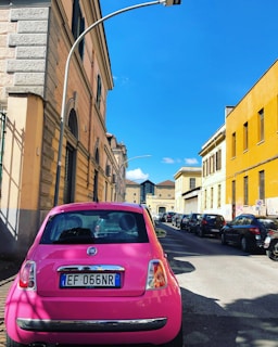 A modern Fiat Mobi parked in a city setting.