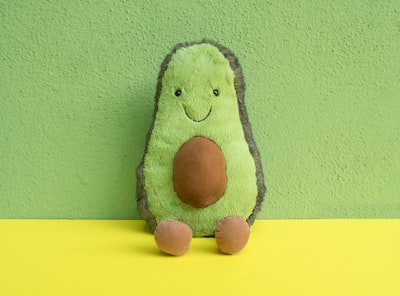 green and black animal plush toy interesting google meet background