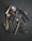 Various tailoring tools are scattered on a dark fabric background. Among these tools are scissors, a measuring tape, a spool of thread, a zipper, metal buckles, a wooden mallet, pliers, cutters, and other sewing accessories.