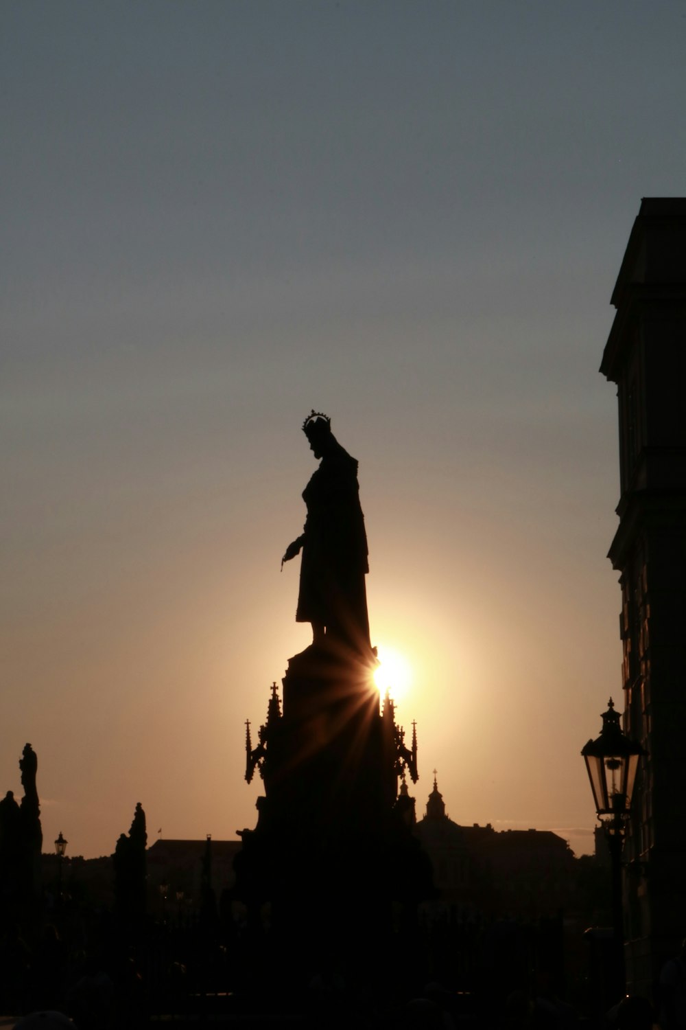 silhouette of man statue