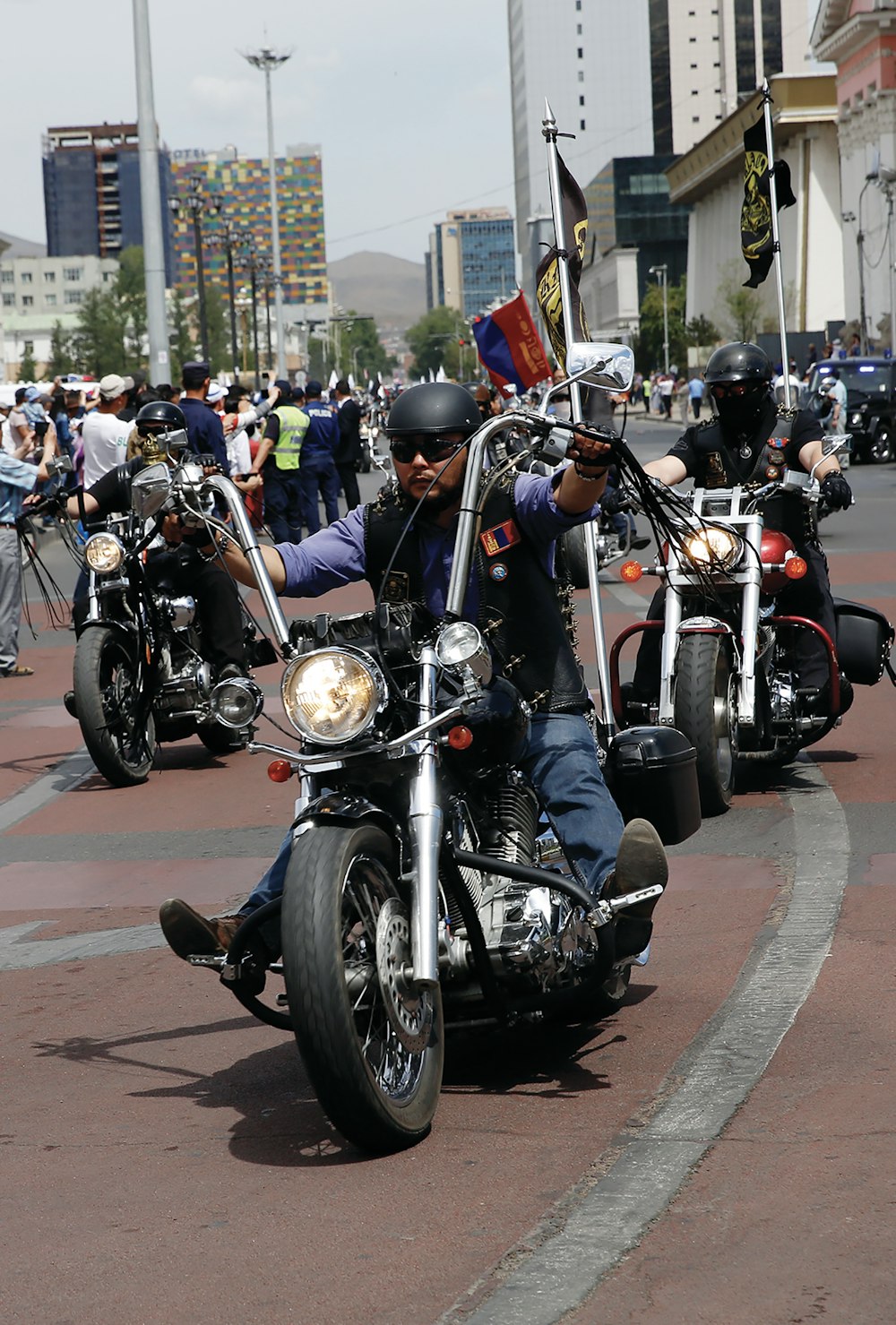 man in sunglasses riding chopper motorcycle