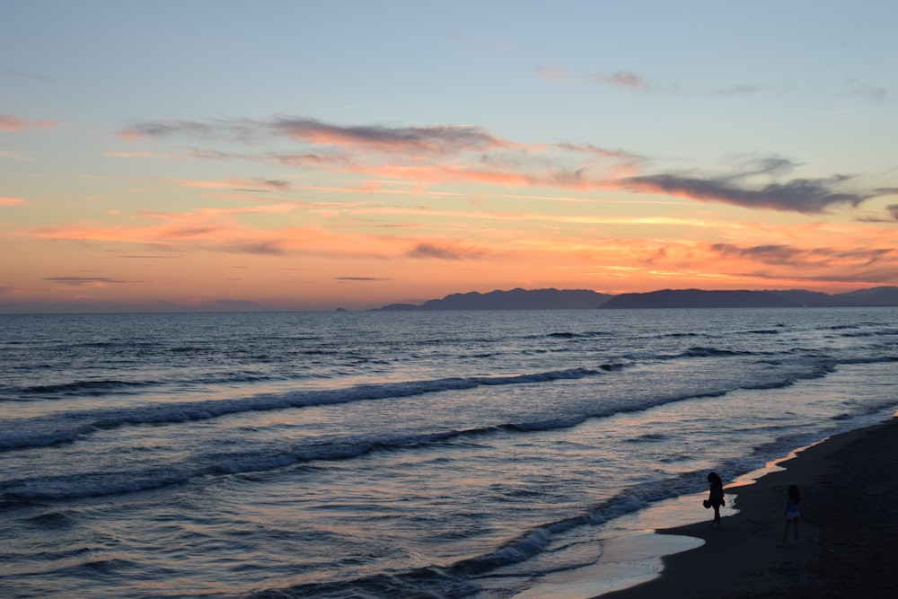 silhouette of person on beach