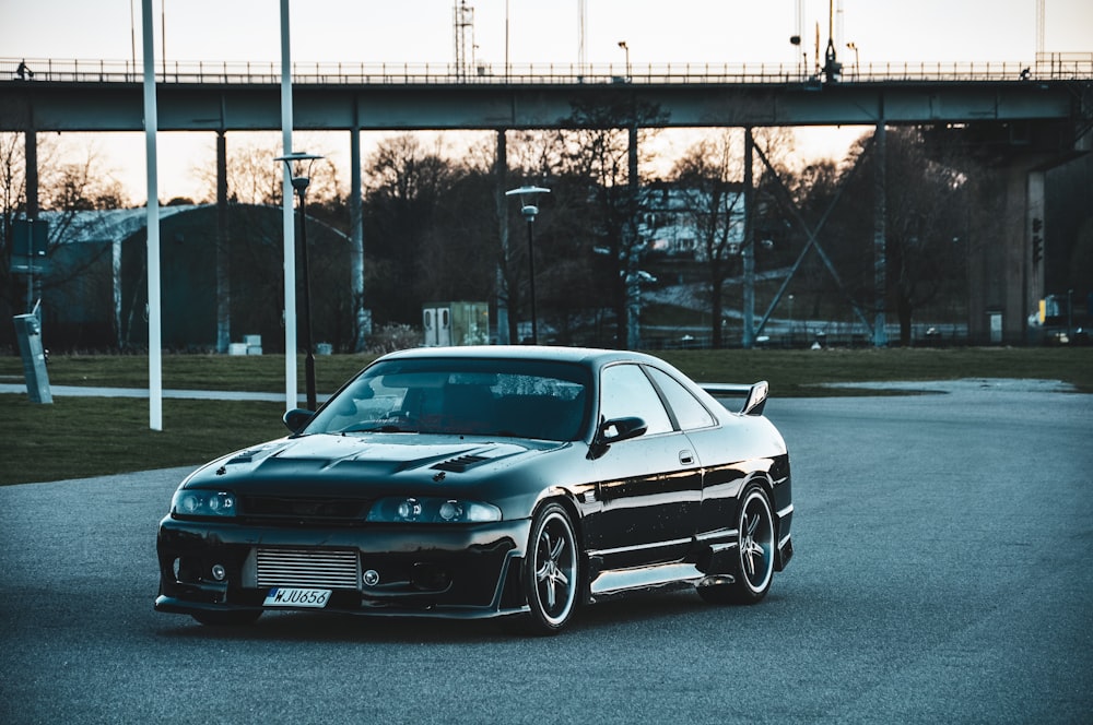 black coupe on road