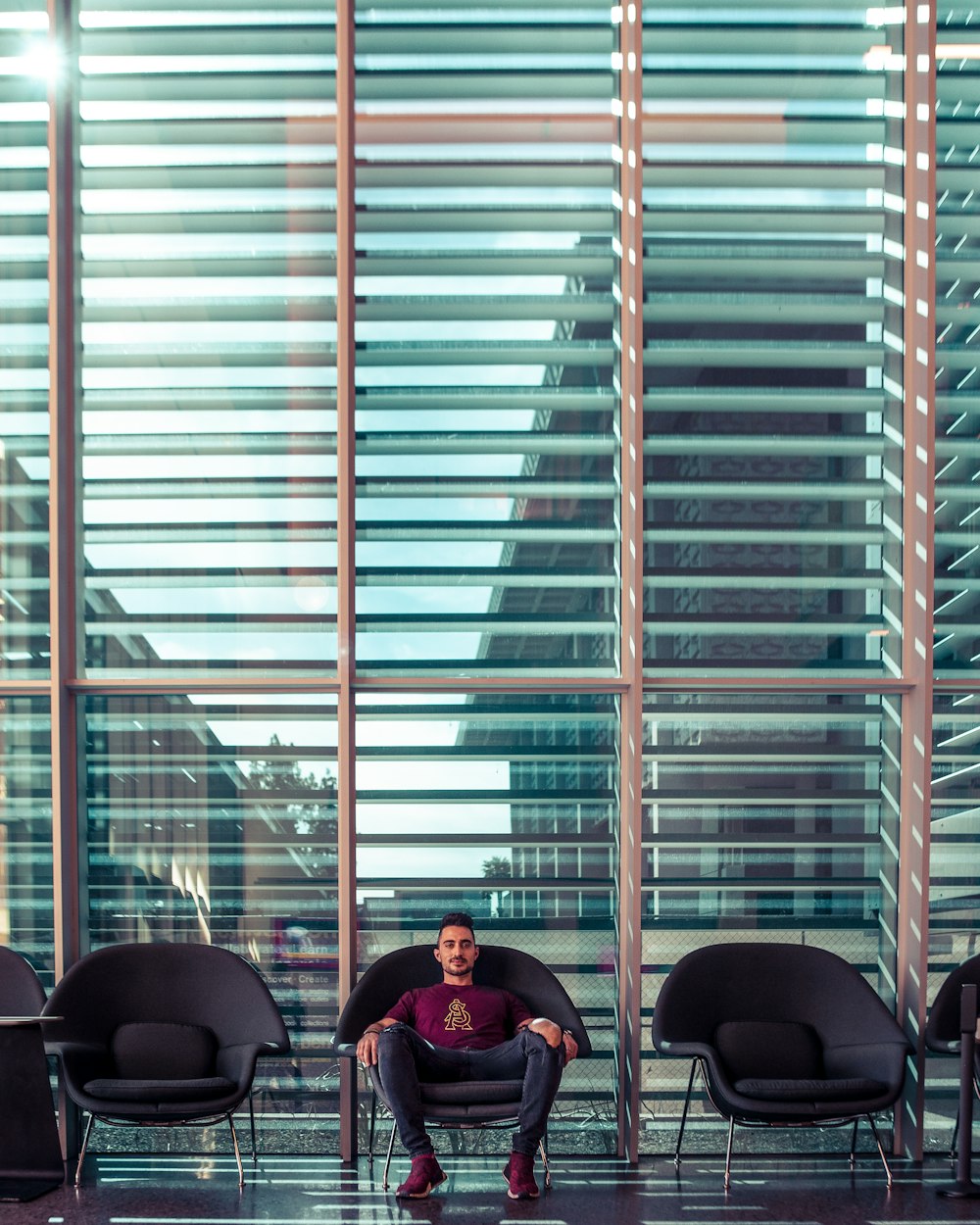 close-up photography of man seated