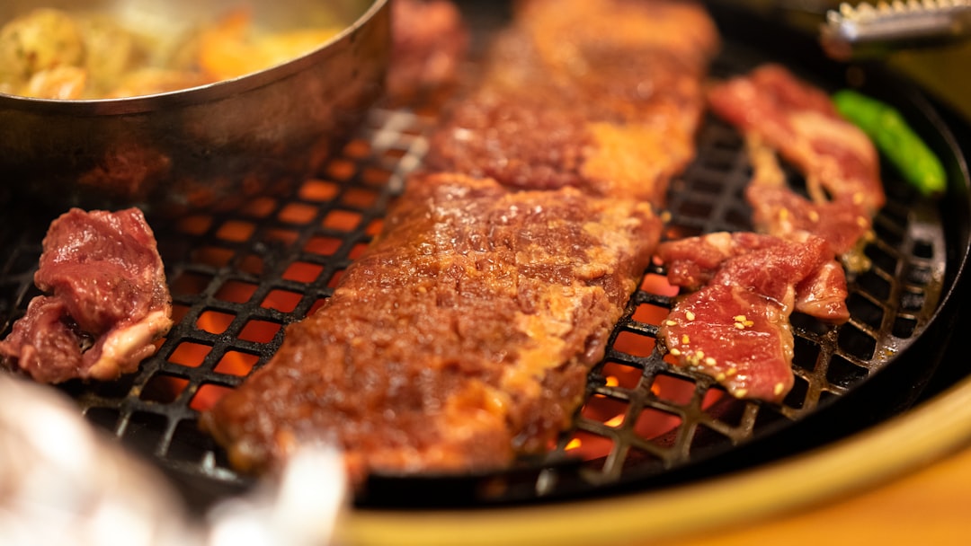 meat being grilled on stove