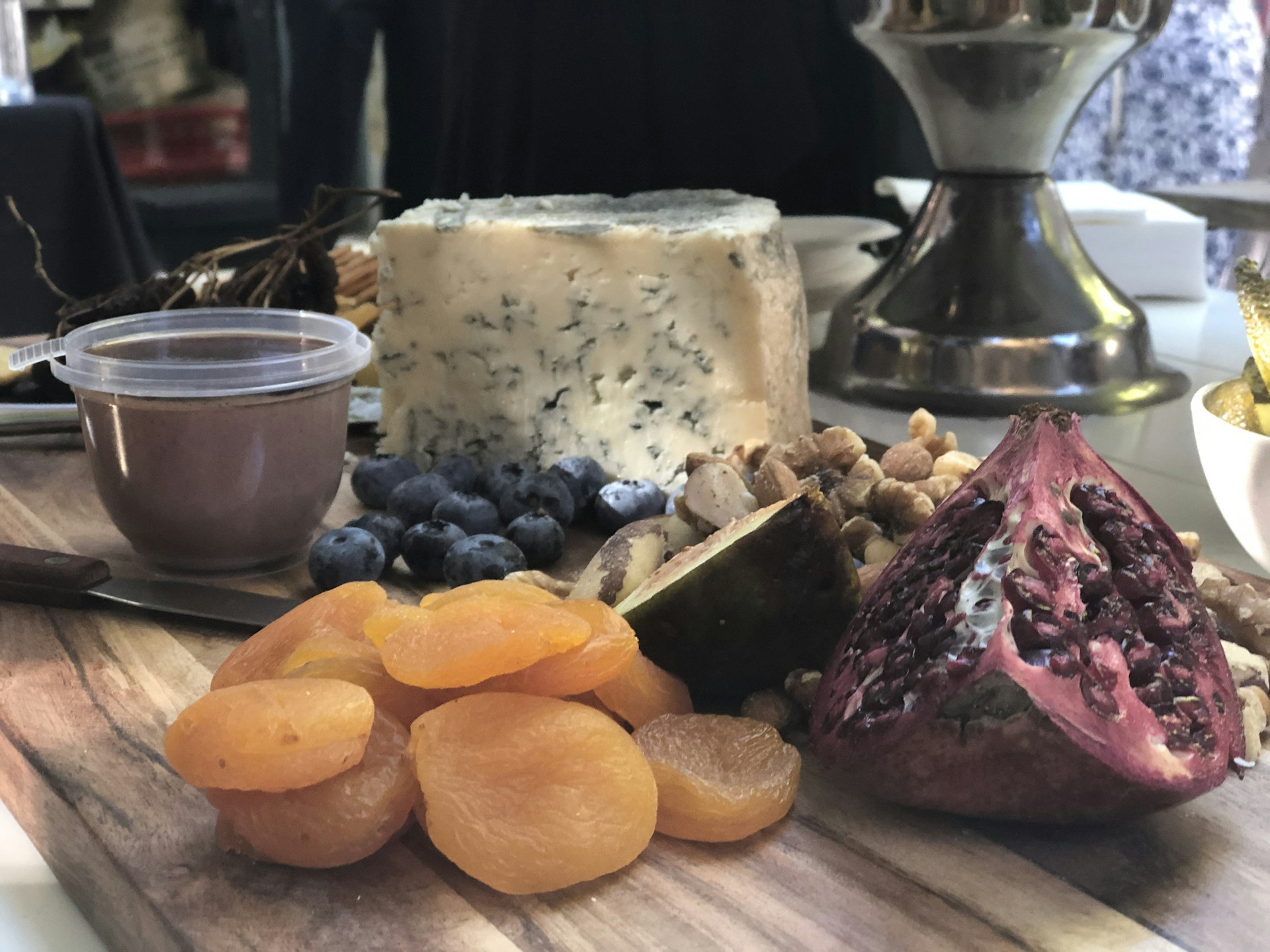woman wearing yellow long-sleeved dress under white clouds and blue sky during daytime