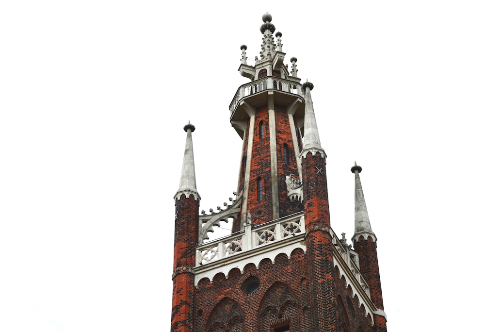 red and black concrete tower at daytime