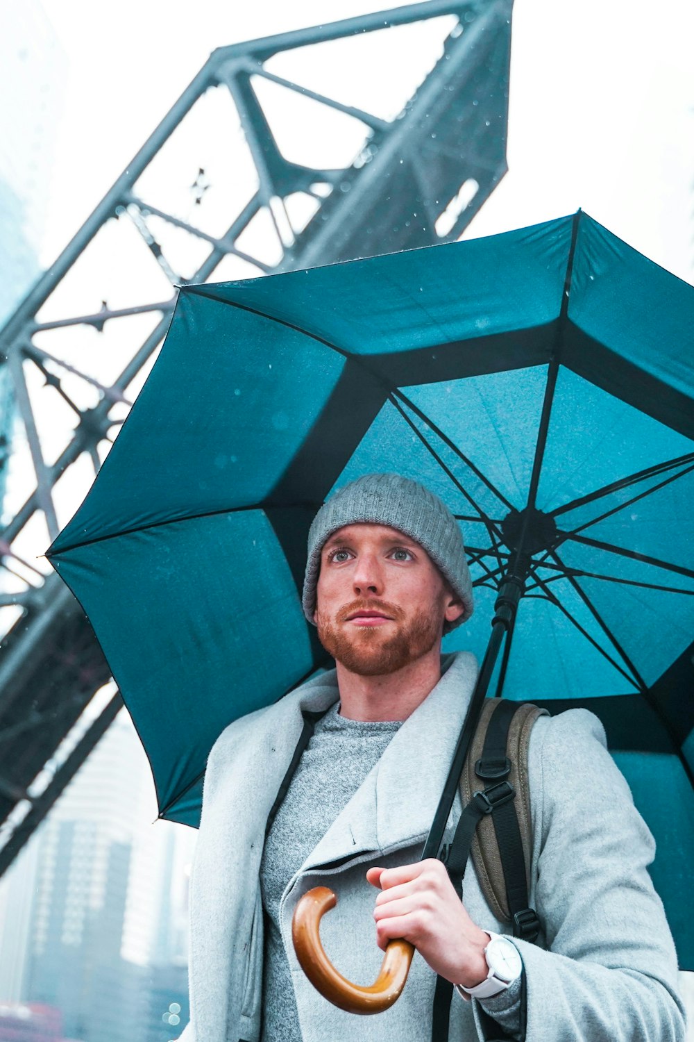 ma using umbrella under concrete bridger