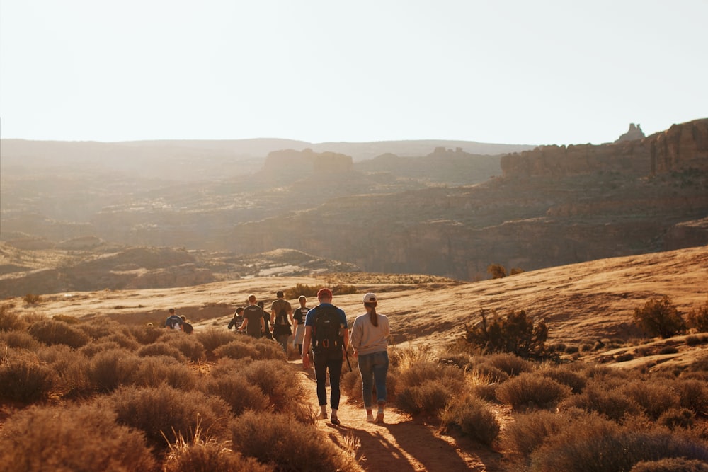 people walking desert